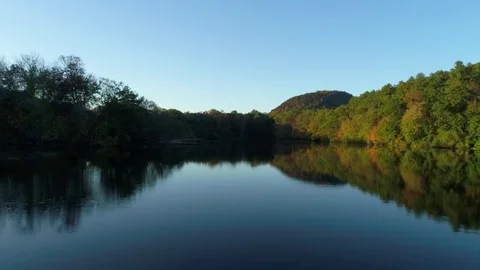 Backward drone flyover directly above lake Video stock 83250249