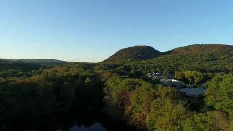 Backward drone flyover lake at 60 frames per second Video stock 83249482