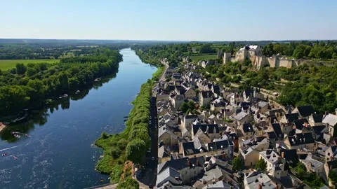 Backward drone panorama fly over the Chinon town with Forteresse Royale de Stock Footage 315677919