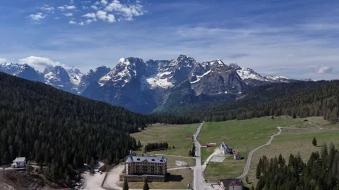 Backward Drone Pullout From Snowy Dolomite Peaks Over Scenic Mountain Me Stock Footage 340307840