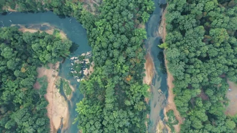 Backward drone top down view of Nam Hinboun river in Kong Lor, Laos Video stock 247383274
