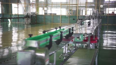 Backward factory assembly lines in Southeast Asia Stock Footage 243036296