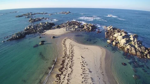 Backward flight over a coastal tip on Atlantic ocean. 4K footage - 2 of 3. Stock Footage 86476411