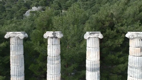 Backward flight from over the columns of Athena temple to the ground Stock Footage 104010266