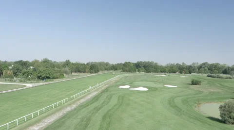 Backward flight over golf course 스톡 동영상 67811086
