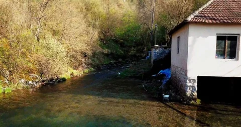 Backward flight from the water mill Stock Footage 106406022