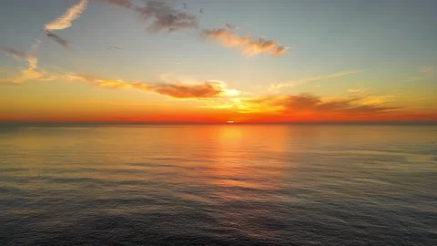 Backward Ocean Flight From Sunset Toward Ancora Coast Evening Colors Stock Footage 321896478