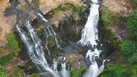 Backward top down aerial view of Tad Gneuang waterfall in Bolaven Plateau, Laos Stock Footage 248197083