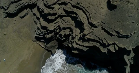 Backward tracking aerial view of Green Sand Beach,Big Island,Hawaii,usa Stock Footage 120775940