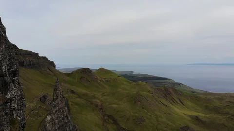 Backwards Aerial Flight past the Old Man of Storr, Isle of Skye Stock Footage 128701294
