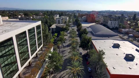 Backwards aerial footage along a street ... | Stock Video | Pond5