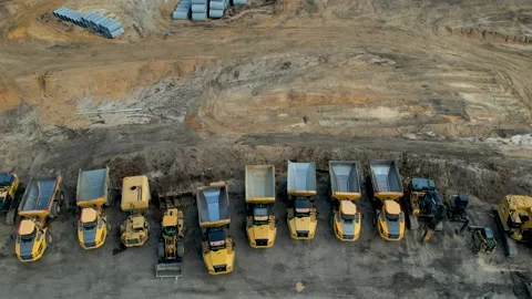 Backwards Aerial view of large construction site Stock Footage 206936017