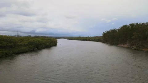 Backwards down the river on a cloudy day Video stock 151658703