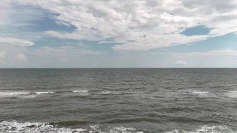 Backwards flight over the black sea in late summer season Stock Footage 283935926