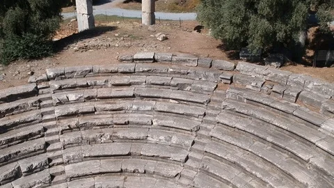 Backwards flying drone view over the gerontikon of nysa ancient city Stock Footage 118091911
