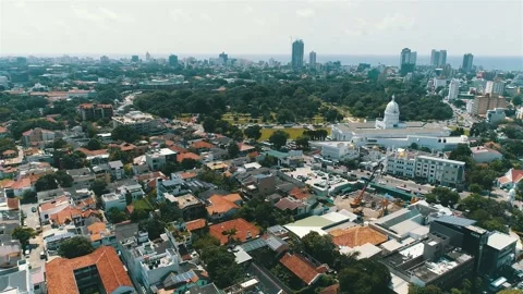 Backwards Flyover over Colombo City Stock Footage 248790383