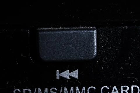 Backwards icon and button close up of a old DVD player Stock Photos