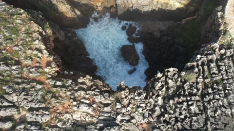 Backwards reveal of Boca do Inferno, Hell's mouth cliff in Cascais, Portugal Stock Footage 220865244
