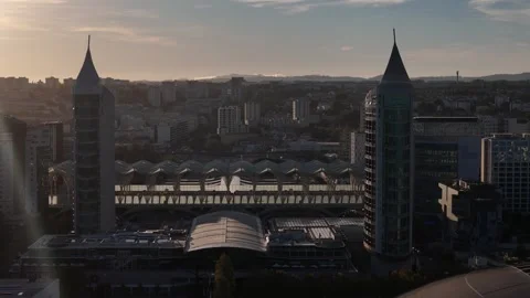 Backwards reveal of Oriente train station and pedestrian promenade in Lisbon Stock Footage 318463048