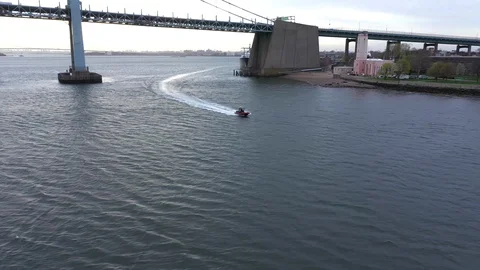 Backwards tracking approaching speedboat in the bay 스톡 동영상 114020841