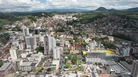 Backwards view of main square with St. Lawrence Church in Manhuacu, Minas Gerais Stock Footage 228999078