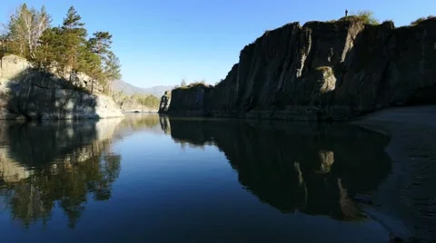 Backwater between rocks at sunrise Stock Footage 63449887
