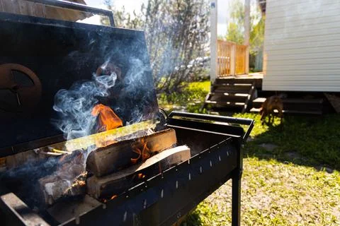 Backyard BBQ: A Fire Starts to Blaze Stock Photos