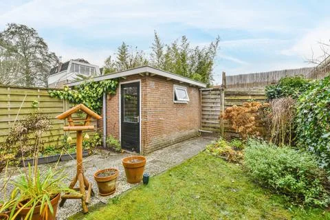 Backyard of building with plants Stock Photos
