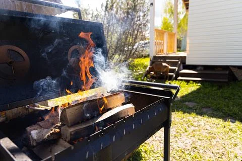 Backyard Grill Flames Ready for Summer Feast Stock Photos