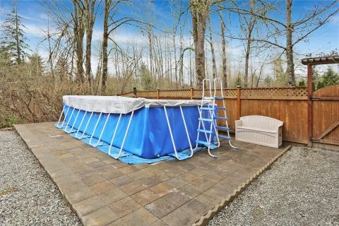 Backyard with jacuzzi  during early spring Stock Photos