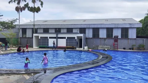Backyard of a modern house with swimming pool Stock Footage 307757021