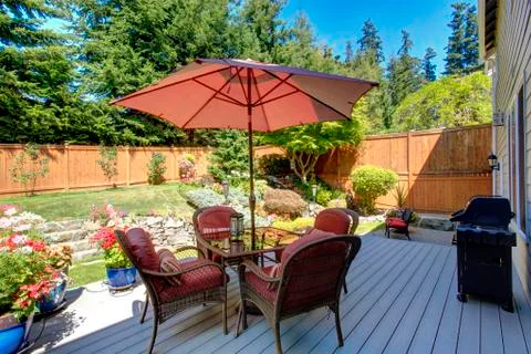 Backyard patio area with landscape Stock Photos
