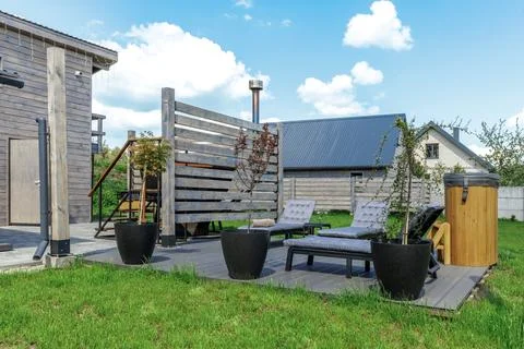 Backyard Patio Deck with Lounge Chairs and Hot Tubs Stock Photos