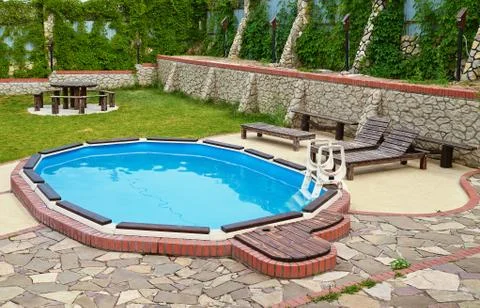 Backyard pool Stock Photos