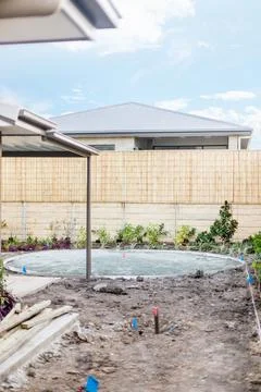 Backyard pool under construction Stock Photos