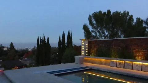 Backyard with Pool, View, String Lights at Dusk Stock Footage 274326425