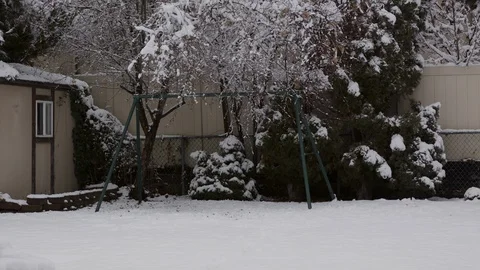 Backyard Shed and Swing Set in Winter Video stock 101039627