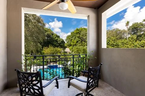 Backyard Surrounded by large vegetation short grass, stone paths Stock Photos
