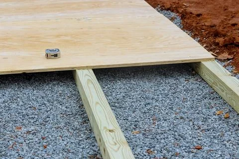 In the backyard, we are building a small shed that will be constructed on a wood Fotos de archivo