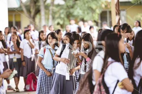 BACOLOD, PHILIPPINES - Mar 01, 2019: A group of Filipino high school ...