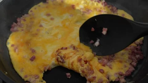 Bacon and Egg Omelet Cooking in Pan Stock Footage 341484970