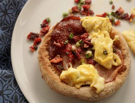 Bacon and eggs on bread for breakfast. Stock Photos