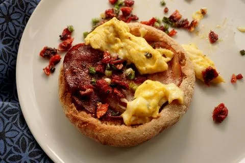 Bacon and eggs on bread for breakfast. Stock Photos