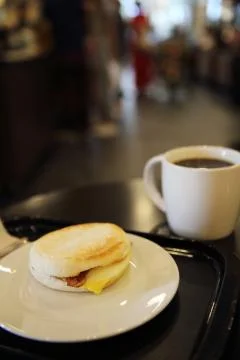 Bacon and fried egg roll with coffee Stock Photos