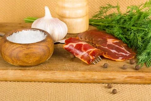 Bacon and spices Stock Photos