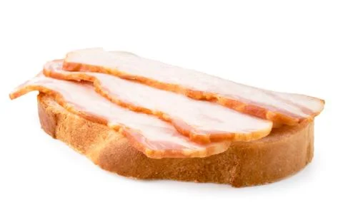 Bacon on bread. Sandwich on a white, isolated. Stock Photos