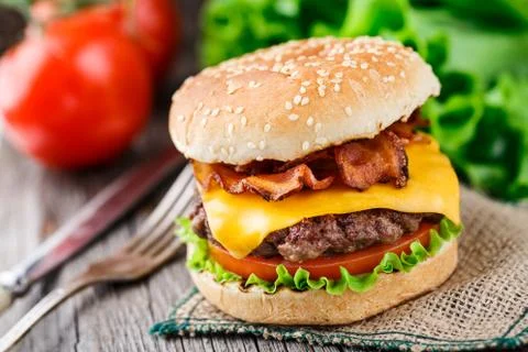 Bacon burger with beef cutlet Stock Photos