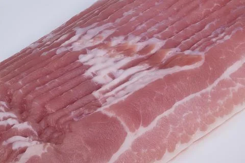 Bacon cheese layers. Perspective view highlights repeated stripe pattern on baco Stock Photos