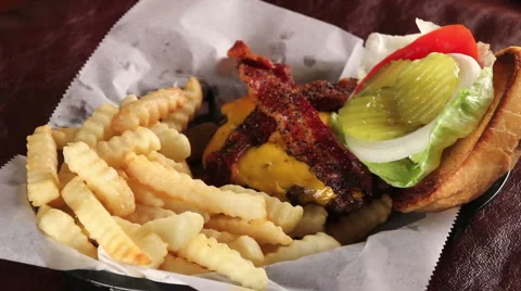 Bacon Cheeseburger and Fries Stock Footage