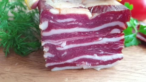 Bacon chop knife slow motion Stock Footage 106350412